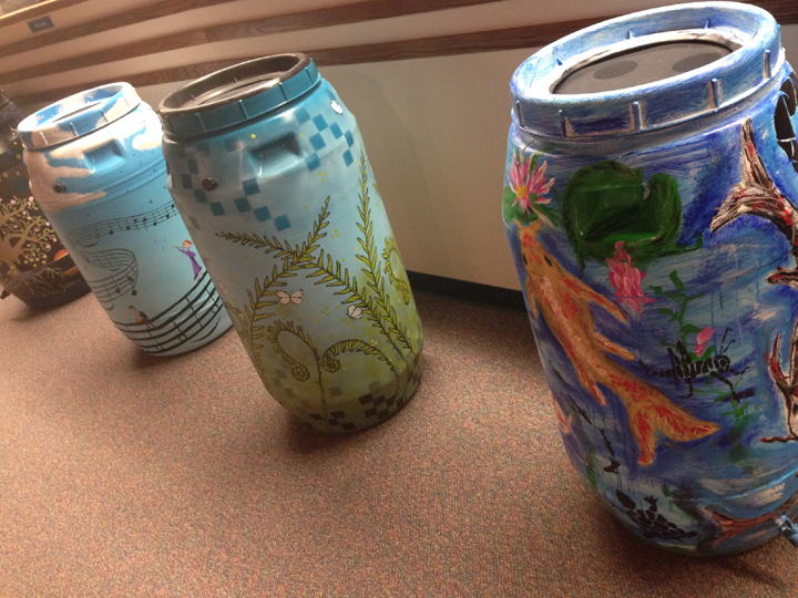 Rain barrels were decorated by local artists and will be available for purchase Nov. 8. (Photo by Sophie Pappas)