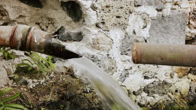stock footage broken water pipe hd a metal water pipe is broken leaking thousands of gallons of clean water