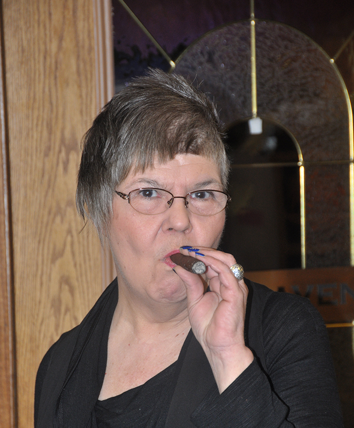 Cigar Haven 8 Barbara Munchel owner of Cigar Haven has enjoyed a good cigar for a long time.WEB