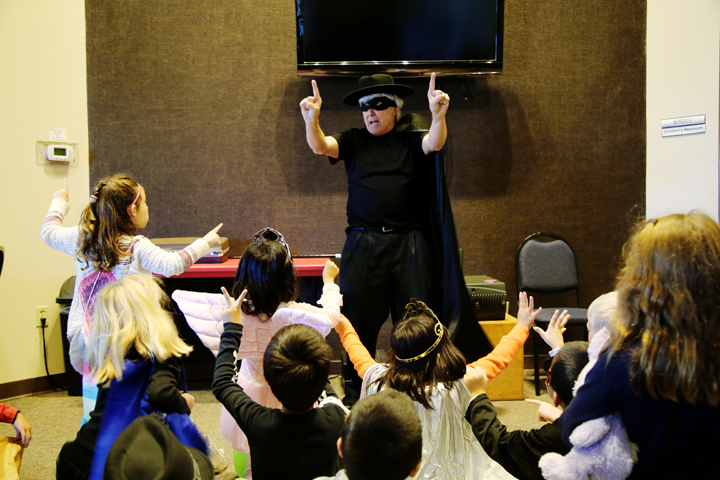 Jerry Zehr performs a magic show for a group of children. (submitted photo)