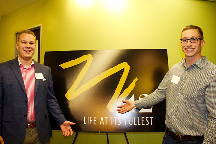 Kevin Patterson, American Family Insurance agent/owner with Garrett Brooks, realtor at Century 21/Sheetz at MEZZ 42 open house.
