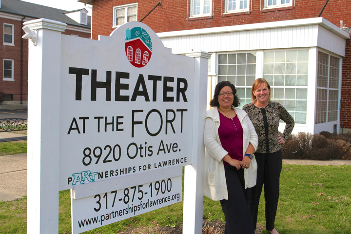 Arts for Lawrence Marketing and Program Director Lecia Floyd and Executive Director Judy Byron pause outside of the historic Theater at the Fort. (Photo by Sadie Hunter)