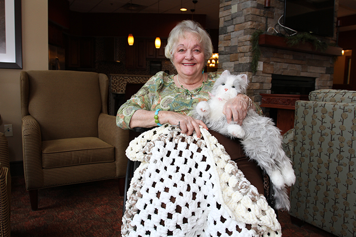 Animal therapy: Local retirement community begins using robotic animals for comfort purposes