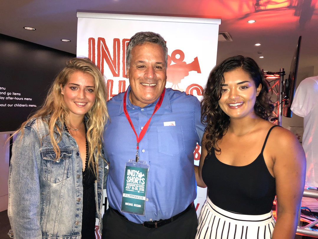 Documentary film Director/Writer Michael Husain (Zionsville) celebrates a big win for his film “When Kids Wrote the Headlines” with his daughters Avalon Husain (Zionsville), left, and Kenna Husain (Zionsville).