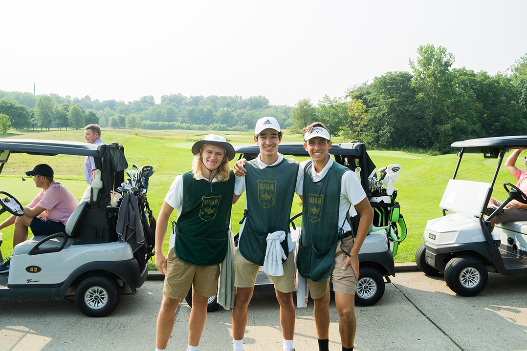 Fore! college green: Caddy program at local golf courses aims to help students compete for full-ride scholarships 
